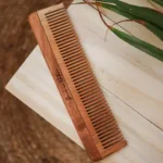 Bask-in-Nature-Neem-Wood-Narrow-Teeth-Styling-Comb-scaled-1.webp